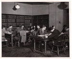 Student studying in law library by University of Pittsburgh School of Law
